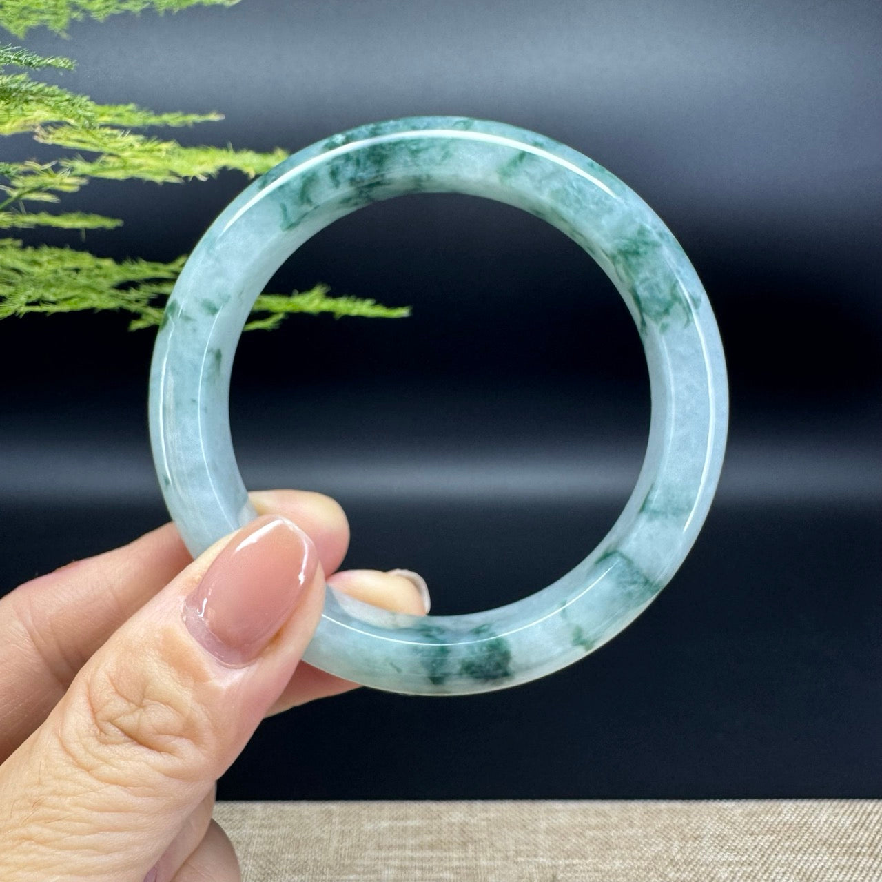 The bangle shape of the half round.The bangle color is icy blue flower.