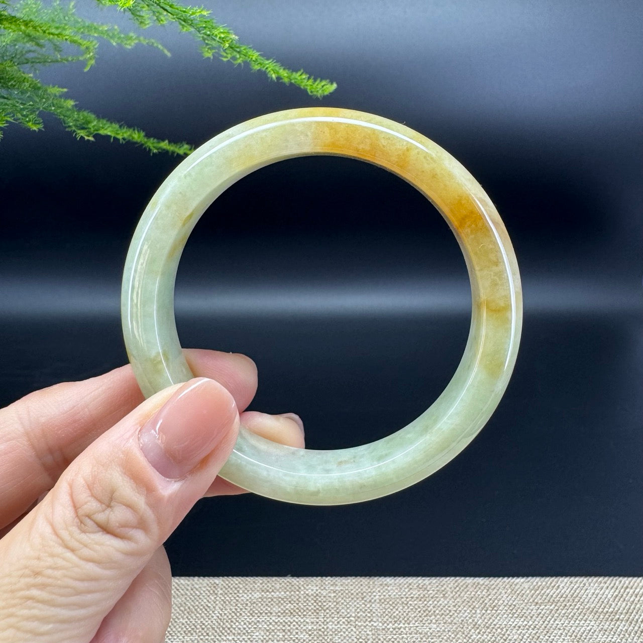 The bangle shape of the half round.The bangle color is yellow.