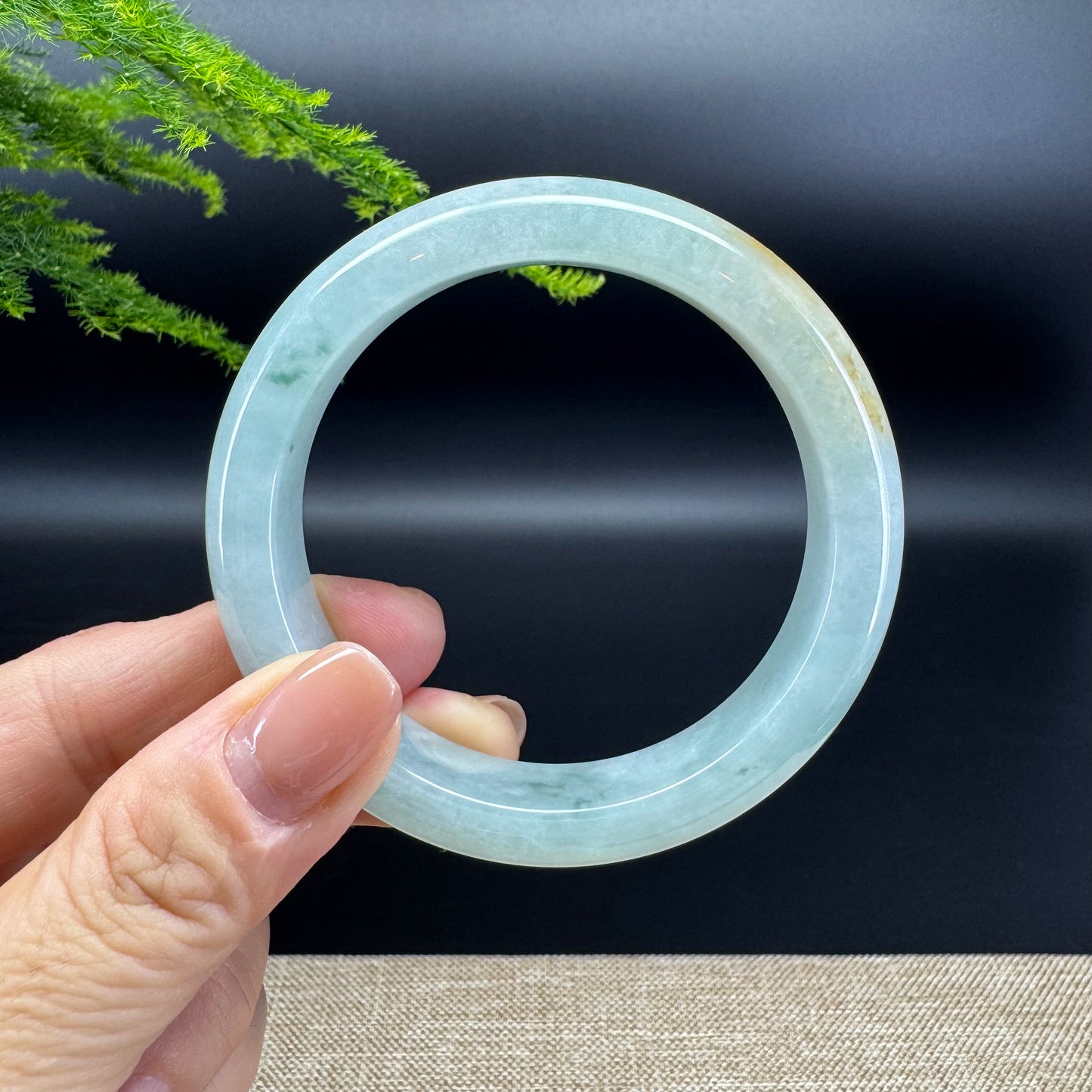 The bangle shape of the half round.The bangle color is yellow green.