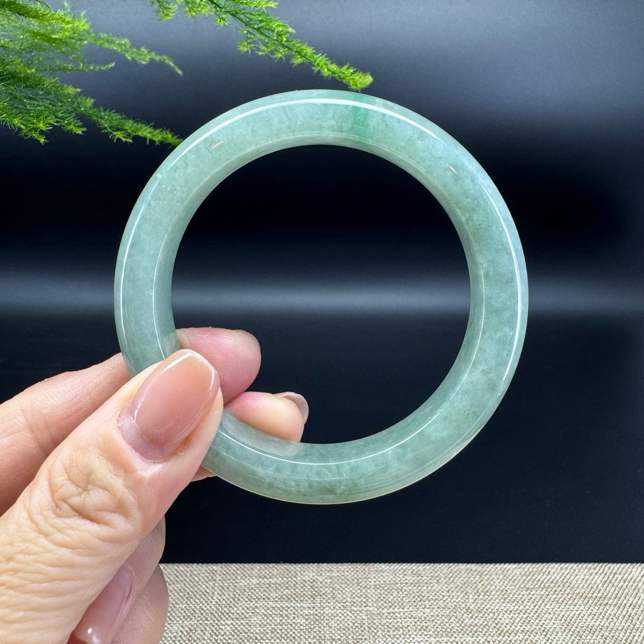 The bangle shape of the half round.The bangle color is oil green.