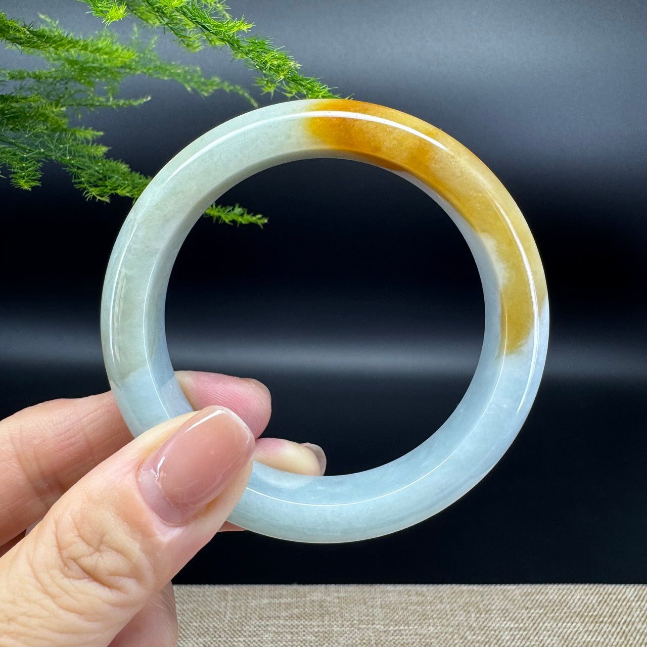 The bangle shape of the half round.The bangle color is yellow green.