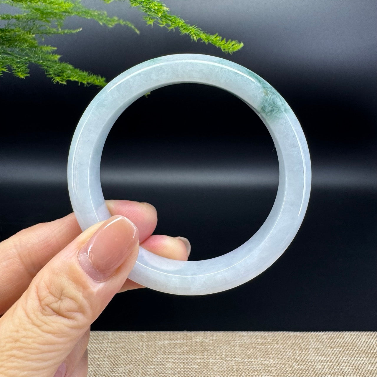 The bangle shape of the half round.The bangle color is lavender green.