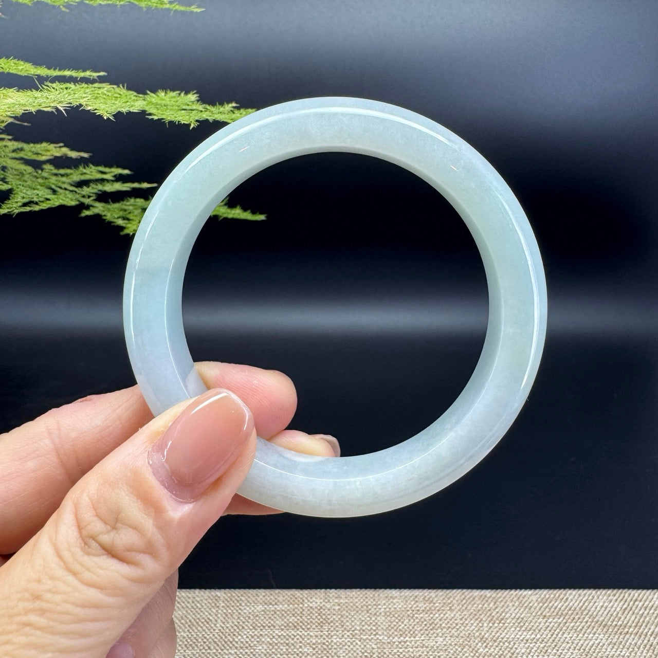 The bangle shape of the half round.The bangle color is icy.