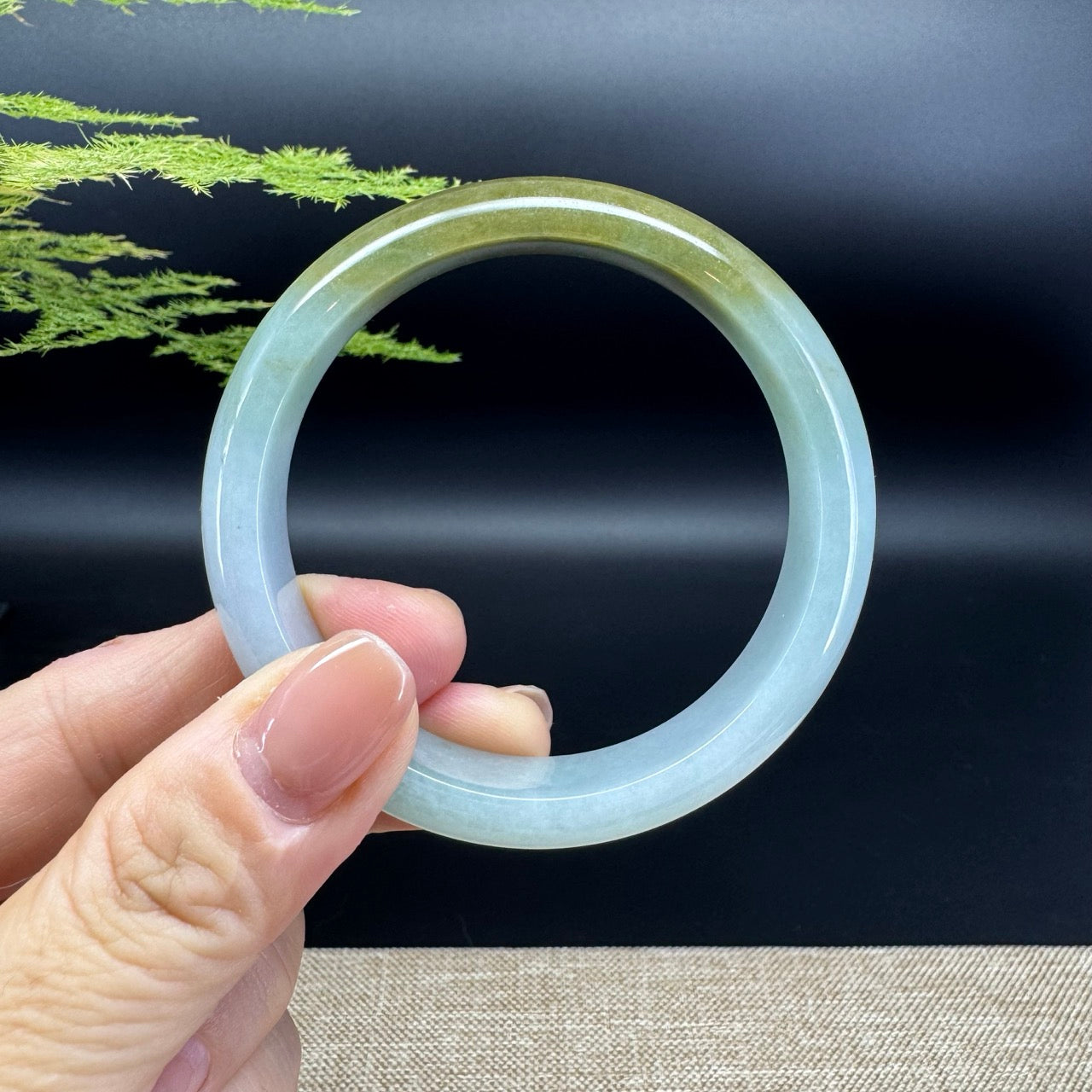The bangle shape of the half round.The bangle color is yellow green.