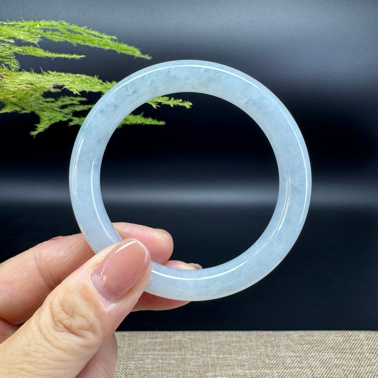 The bangle shape of the round.The bangle color is icy green