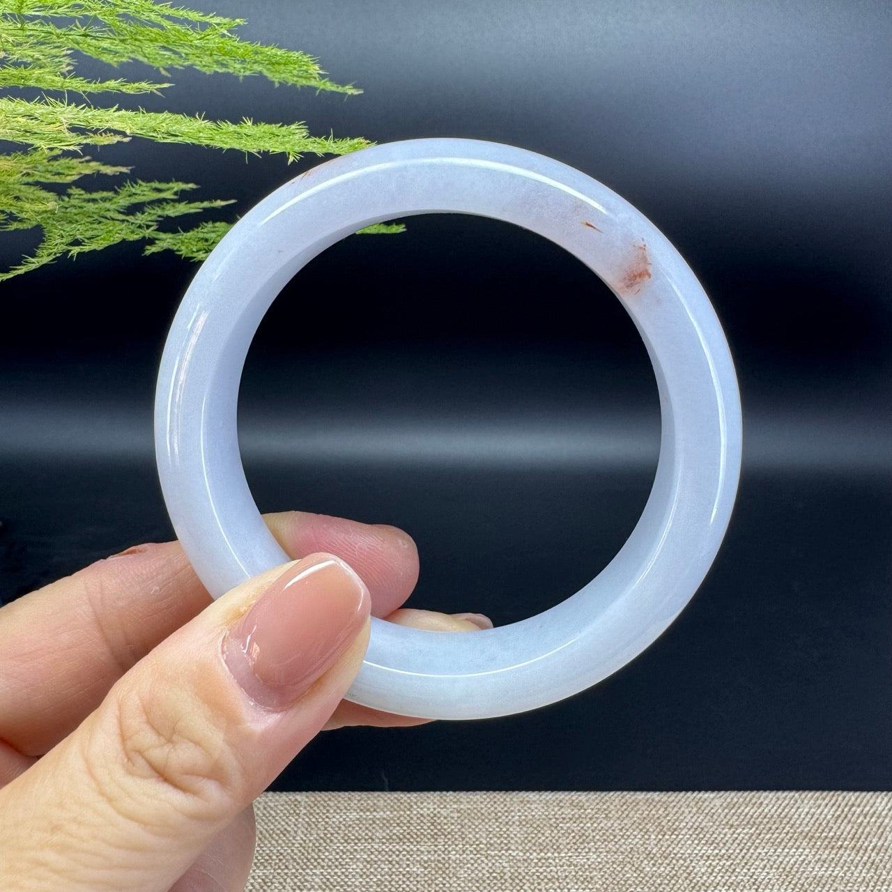 The bangle shape of the half round.The bangle color is lavender