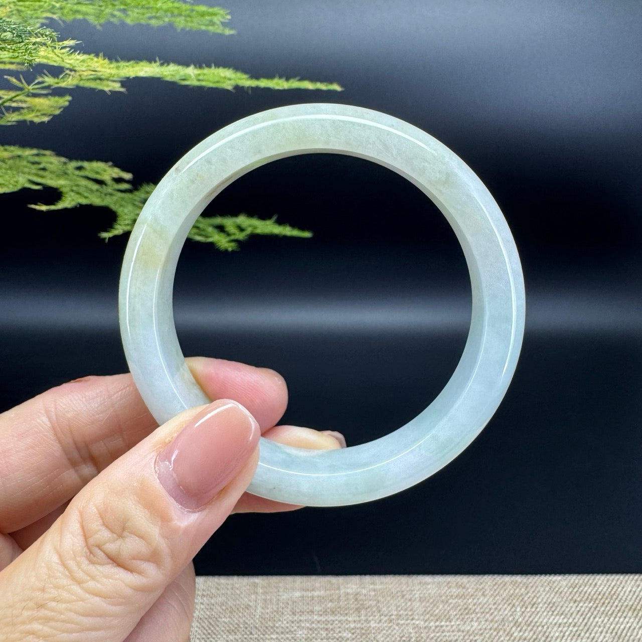 The bangle shape of the half round.The bangle color is icy yellow.