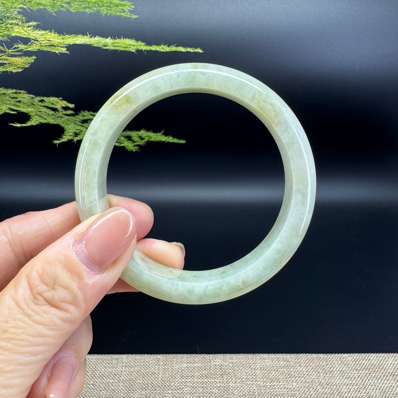 The bangle shape of the half round.The bangle color is yellow.