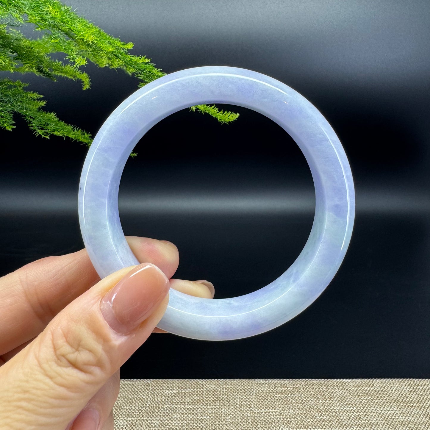 The bangle shape of the half round.The bangle color is lavender.