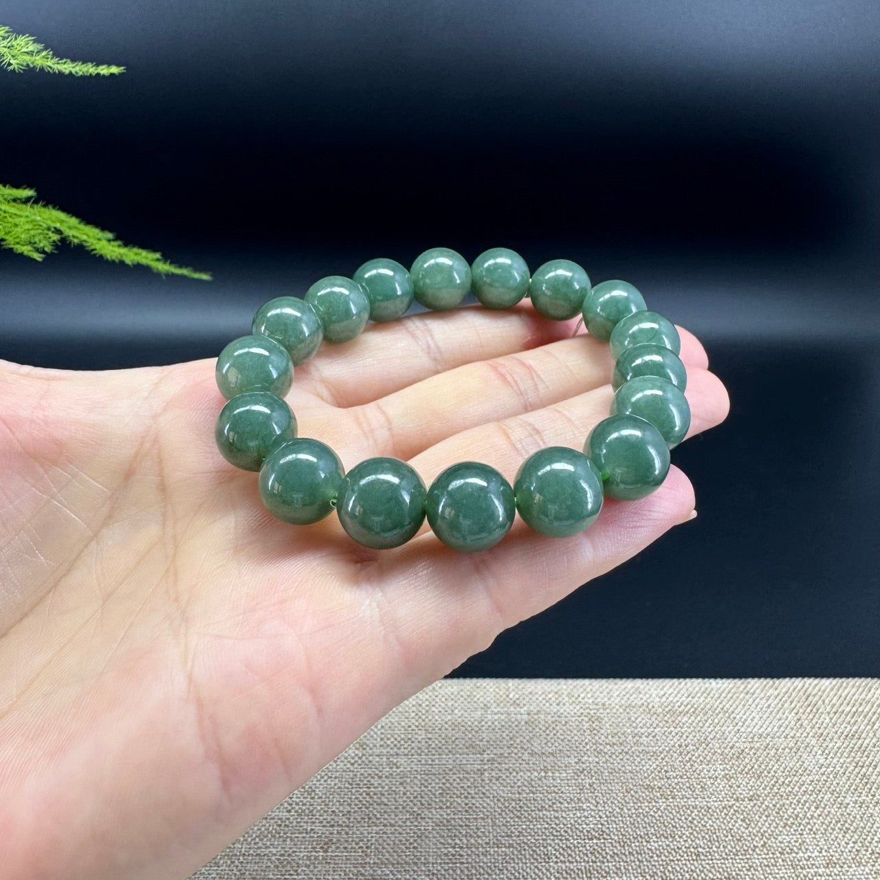 This bracelet is made with very high-quality genuine forest green jadeite jade