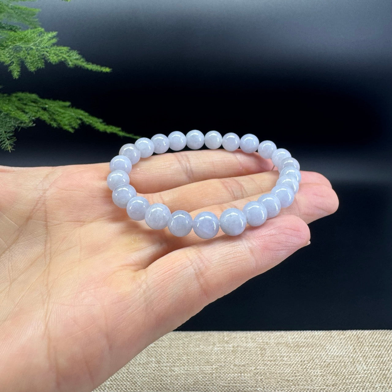 The beads color is lavender.