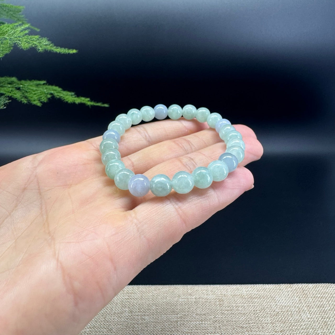 The beads shape of the round.The beads color is lavender green.