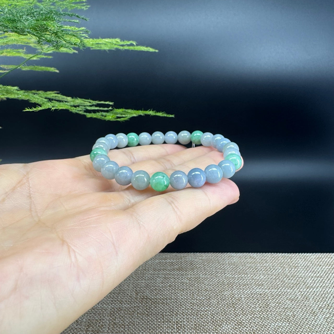 The beads shape of the round.The beads colors are lavender green.