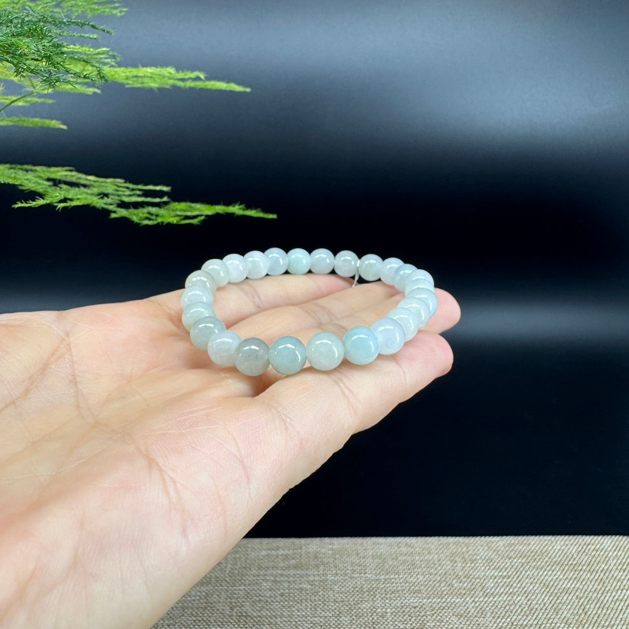 The beads shape of the round.The beads colors are icy green.