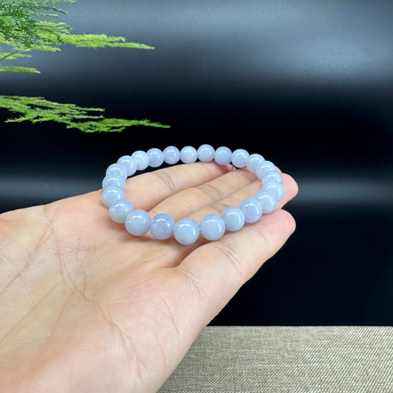 The beads shape of the round.The beads colors are light lavender.