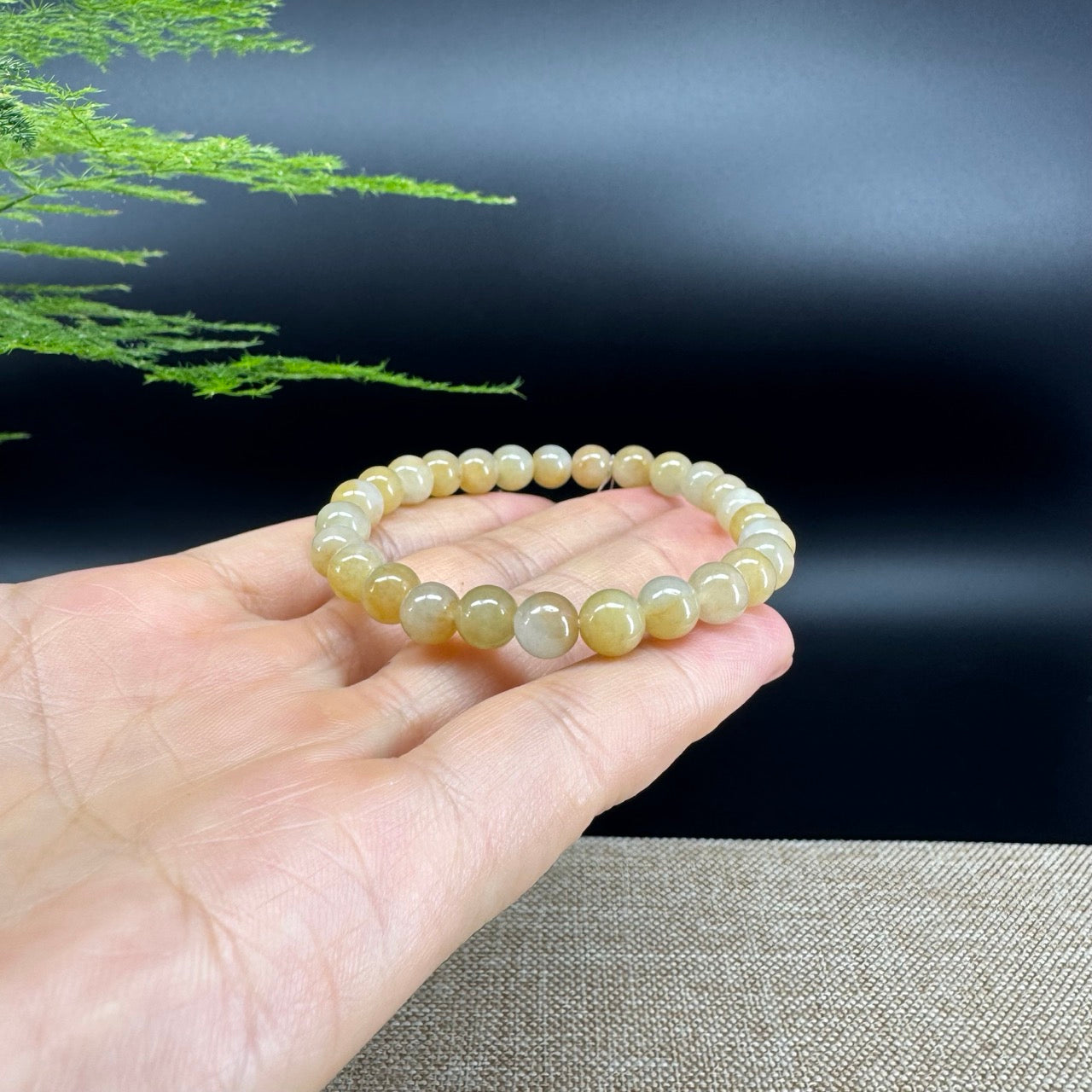 The beads shape of the round.The beads colors are icy yellow.