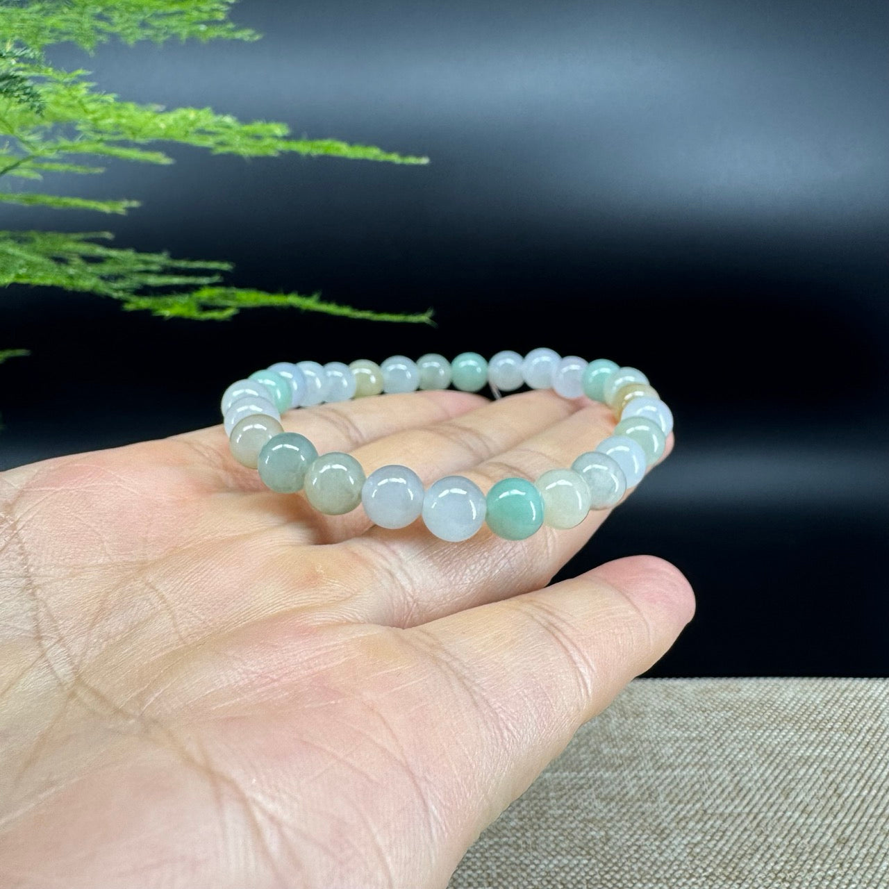 The beads shape of the round.The beads colors are icy green.