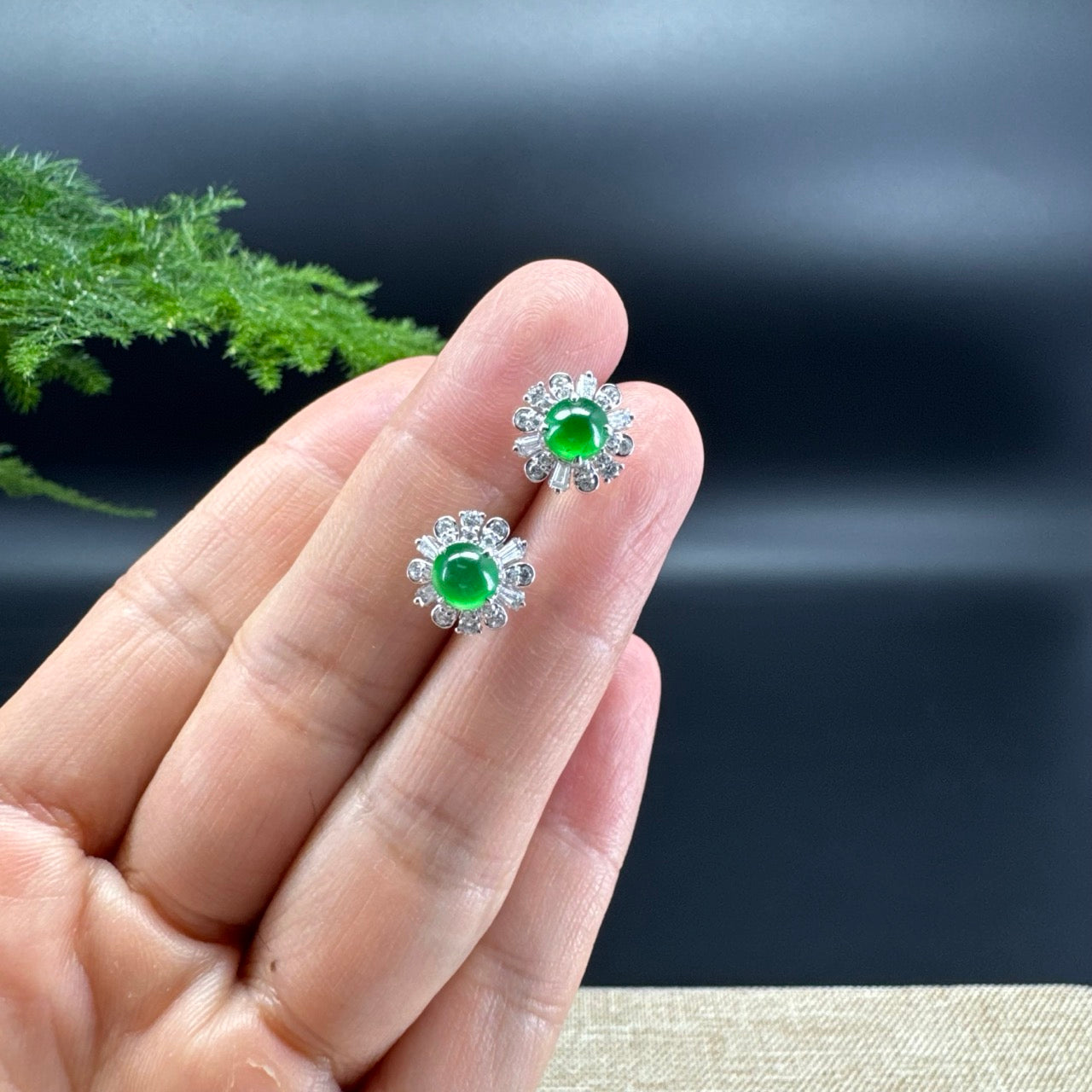 The earring shape of the flower.The jade color is imperial green.