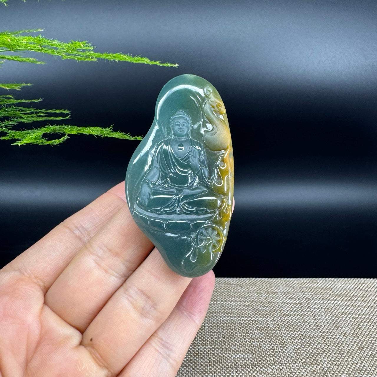 The pendant shape of the guanyin.The pendant color is yellow green.
