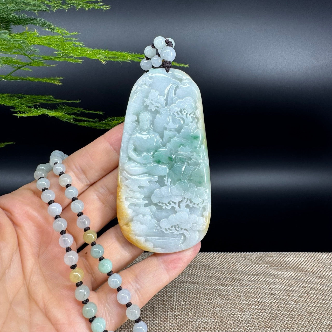 The pendant shape of the guanyin.The pendant color is yellow green.