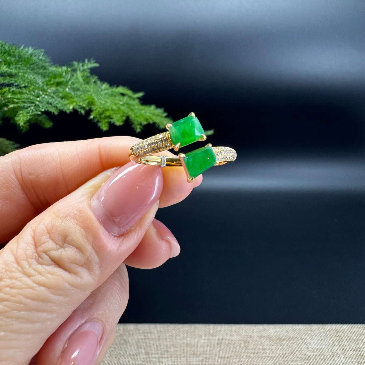 The shape of the ring is rhombus.The ring color is imperial green.