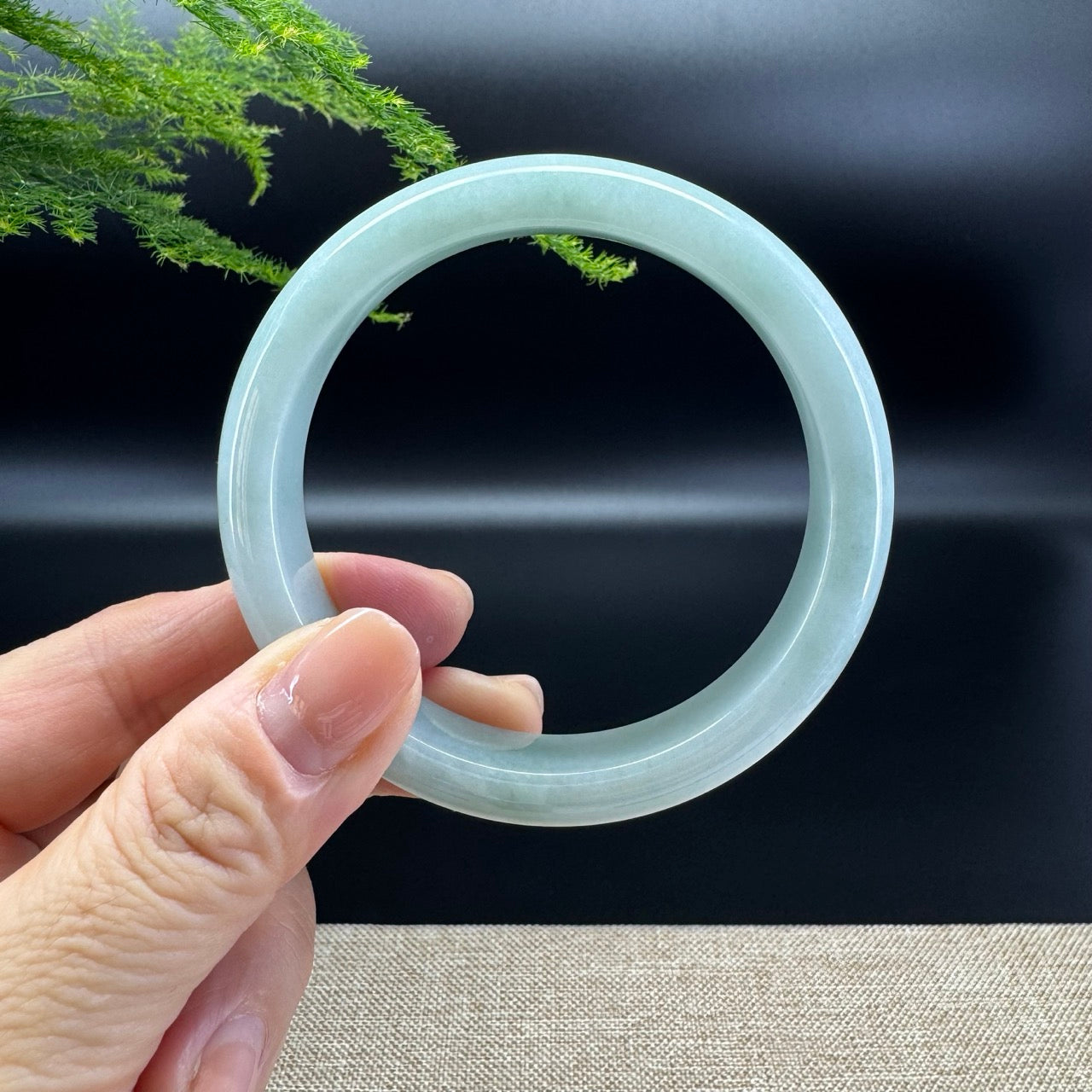 The bangle shape of the half round.The bangle color is apple green.