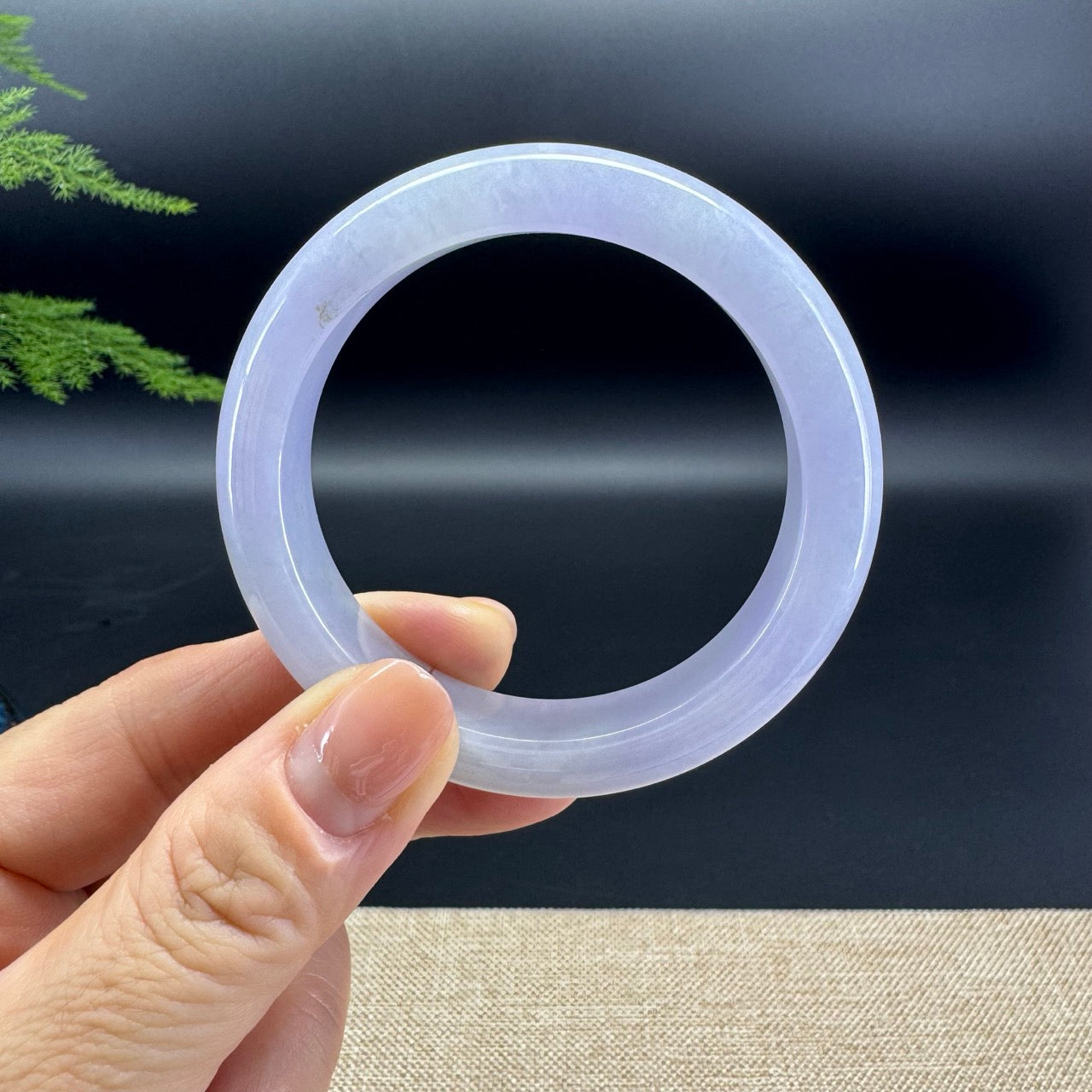 The bangle shape of the half round.The bangle color is lavender.