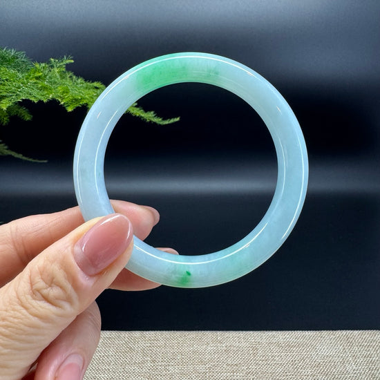 The shape of the bangle is traditional round.The bangle color is icy spicy green.
