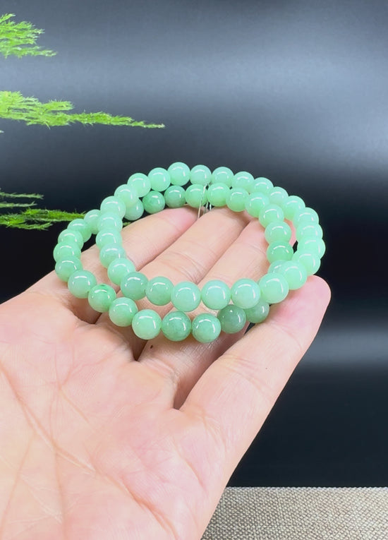Load and play video in Gallery viewer, RealJade® Co. Genuine Jadeite Jade Round Apple Green Beads Bracelet (7 mm)
