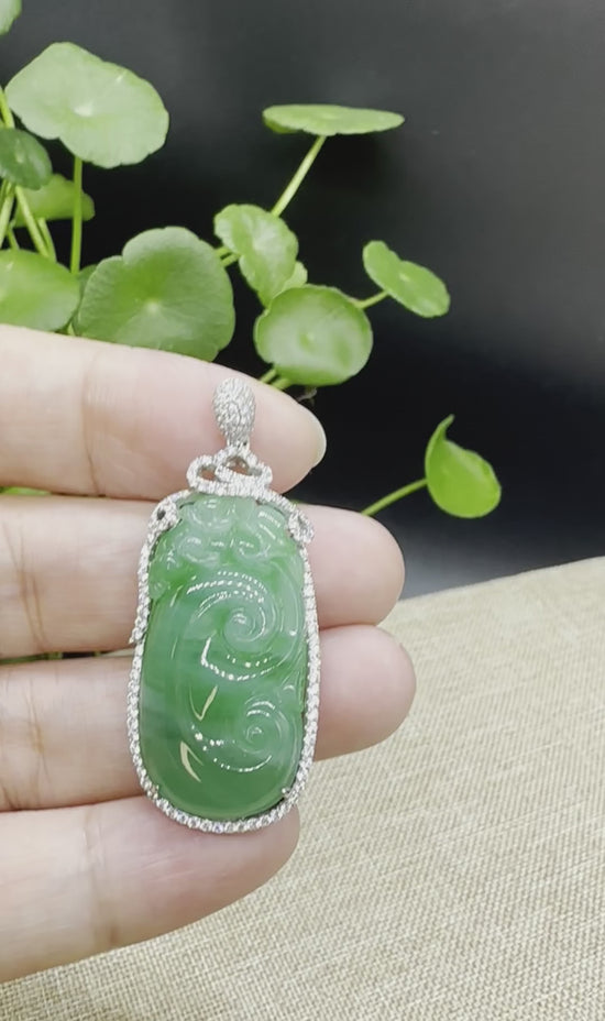 Load and play video in Gallery viewer, High end RealJade® Co. Genuine Burmese Green Jadeite Jade RuYi Pendant with 18k White Gold Diamond Bail
