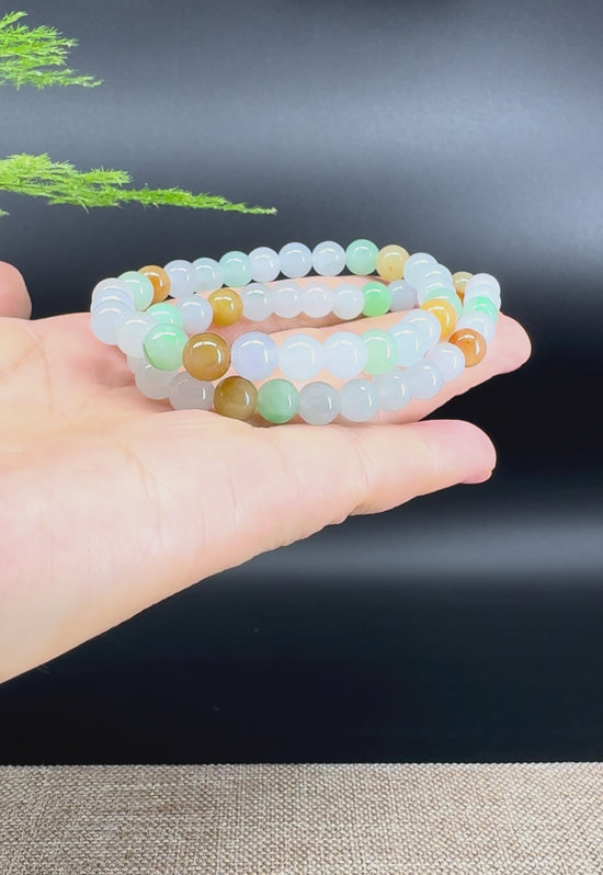Load and play video in Gallery viewer, RealJade® Co. Genuine Jadeite Jade Round Multiple Colors Beads Bracelet (7.5 mm)
