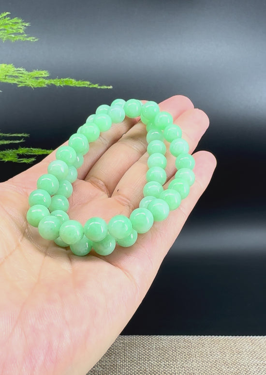 Load and play video in Gallery viewer, RealJade® Co. Genuine Jadeite Jade Round Apple Green Beads Bracelet (7.5mm)
