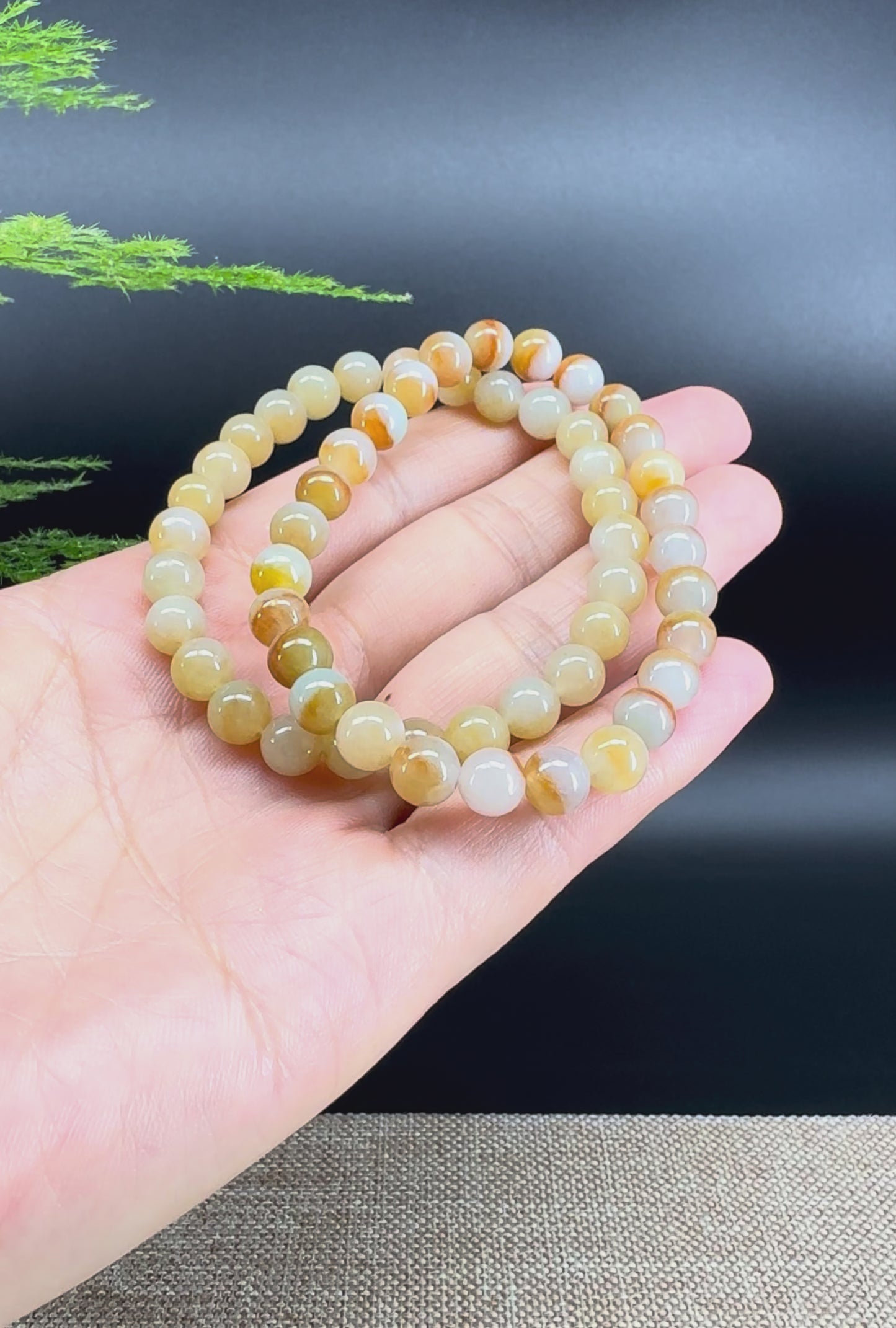 Load and play video in Gallery viewer, RealJade® Co. Genuine Jadeite Jade Round Ice Yellow Beads Bracelet (7 mm)
