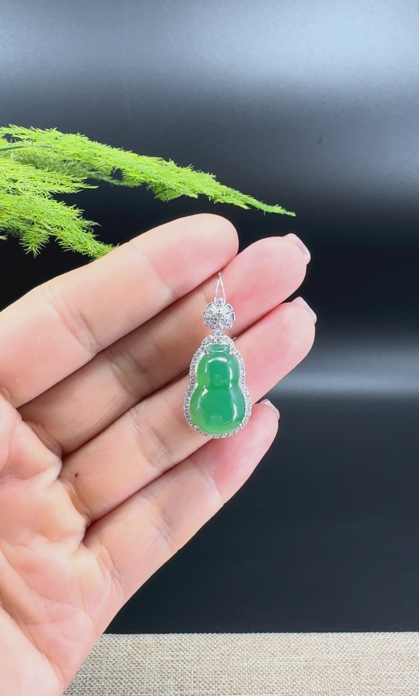 Load and play video in Gallery viewer, RealJade® Co. Genuine Green Jadeite Jade Good Luck Hulu Bottle Gourd Necklace With 18K White Gold Bail
