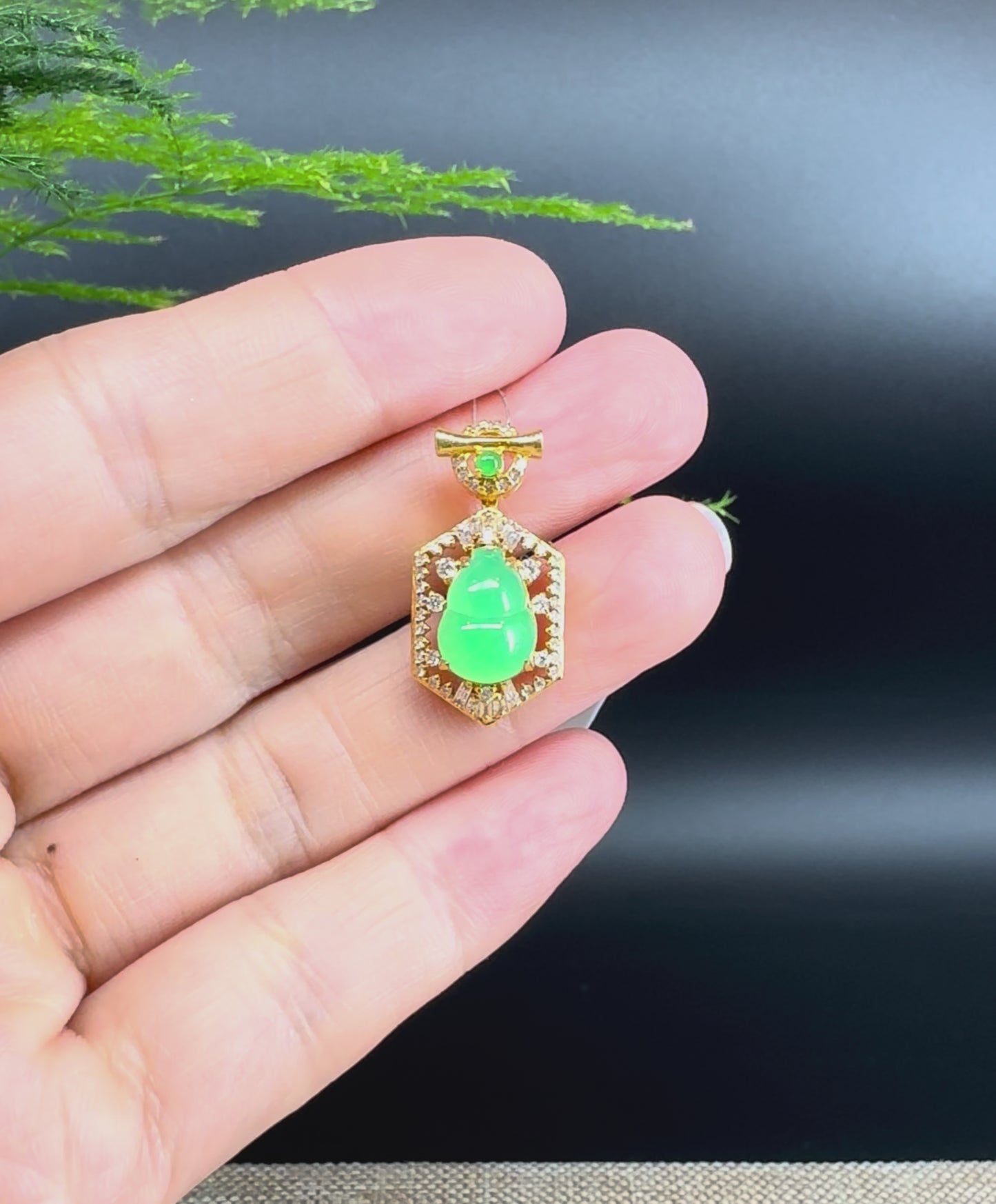 Load and play video in Gallery viewer, RealJade® Co. Genuine Green Jadeite Jade Good Luck Hulu Bottle Gourd Necklace With 18K Yellow Gold Bail
