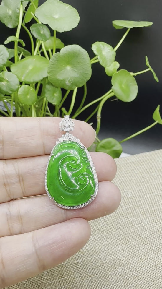 Load and play video in Gallery viewer, RealJade® Co. Genuine Burmese Green Jadeite Jade RuYi Pendant with 18k White Gold Diamond Bail
