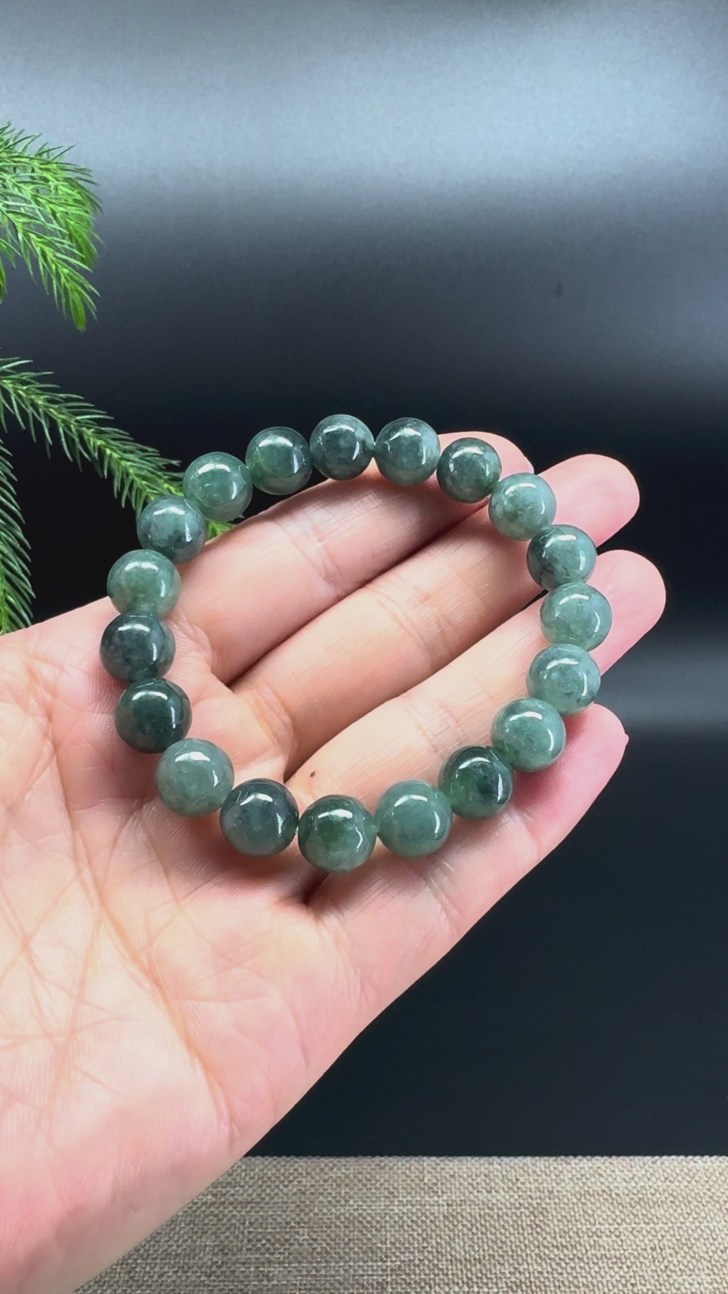Load and play video in Gallery viewer, RealJade® Genuine Jadeite Jade Round Dark Green Beads Bracelet ( 10mm )
