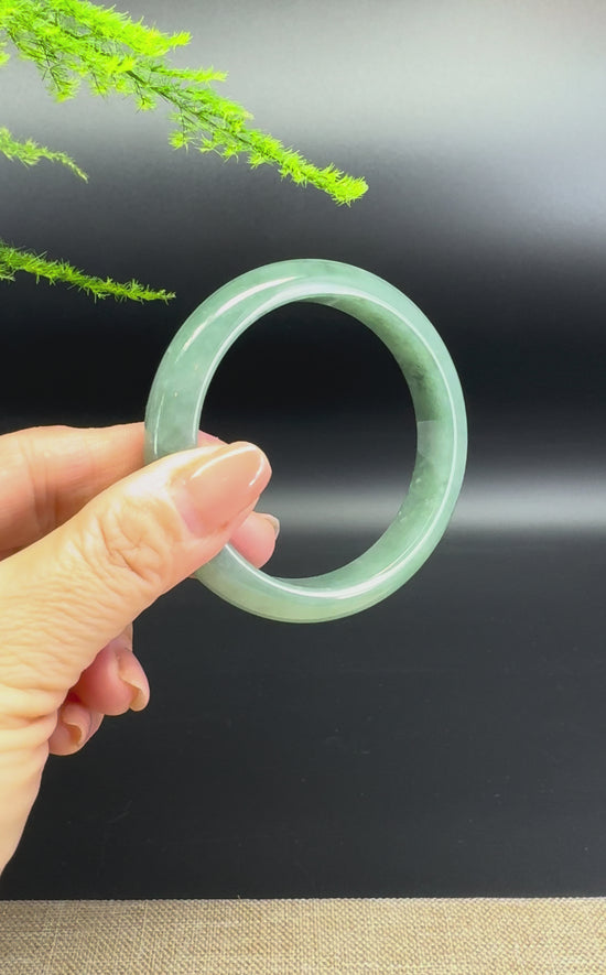 Load and play video in Gallery viewer, Genuine Burmese Oil Green Jade Jadeite Bangle Bracelet ( 55.8mm )
