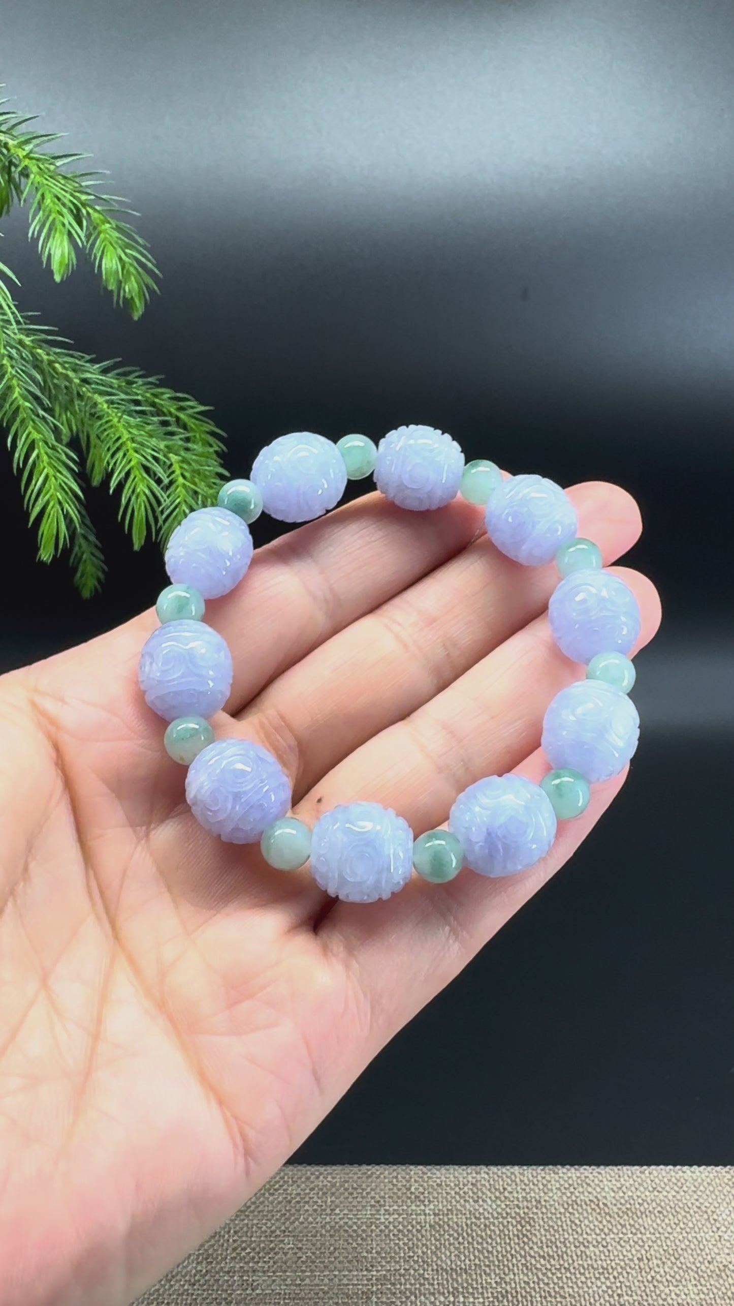 Load and play video in Gallery viewer, RealJade® Co. Genuine Lavender Jadeite Jade Carved Beads Bracelet (12mm)
