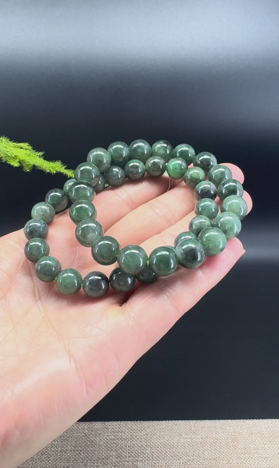 Load and play video in Gallery viewer, Natural Jadeite Jade Round Dark Green Beads Bracelet ( 10 mm )
