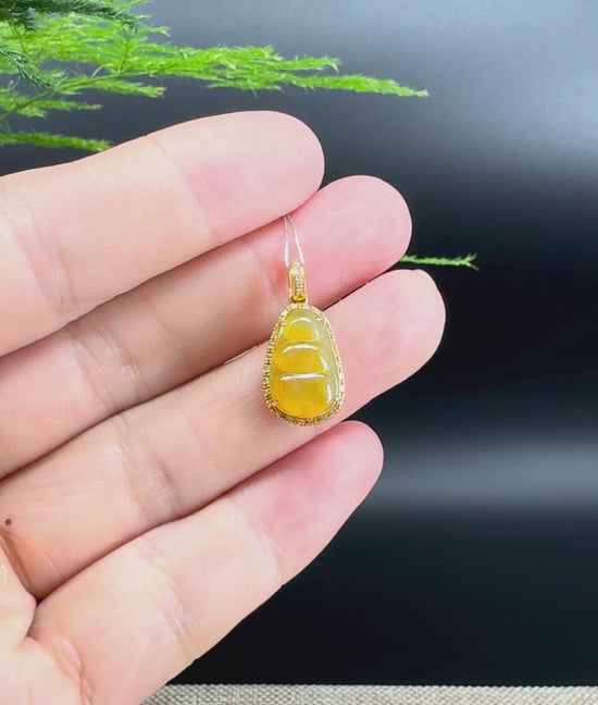 Load and play video in Gallery viewer, High end Genuine Burmese Honey yellow Jadeite Pendant with 18k Yellow Gold Bail
