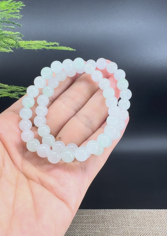 Load and play video in Gallery viewer, RealJade® Co. Genuine Jadeite Jade Round Icy Green  Beads Bracelet (7.3 mm)
