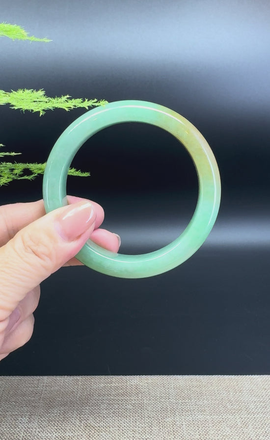 Load and play video in Gallery viewer, Genuine Burmese Yellowish-Brown Green Jade Jadeite Bangle Bracelet ( 55.9mm )
