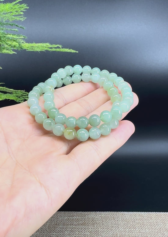 Load and play video in Gallery viewer, RealJade® Co. Genuine Jadeite Jade Round Light Green  Beads Bracelet (7.4mm)
