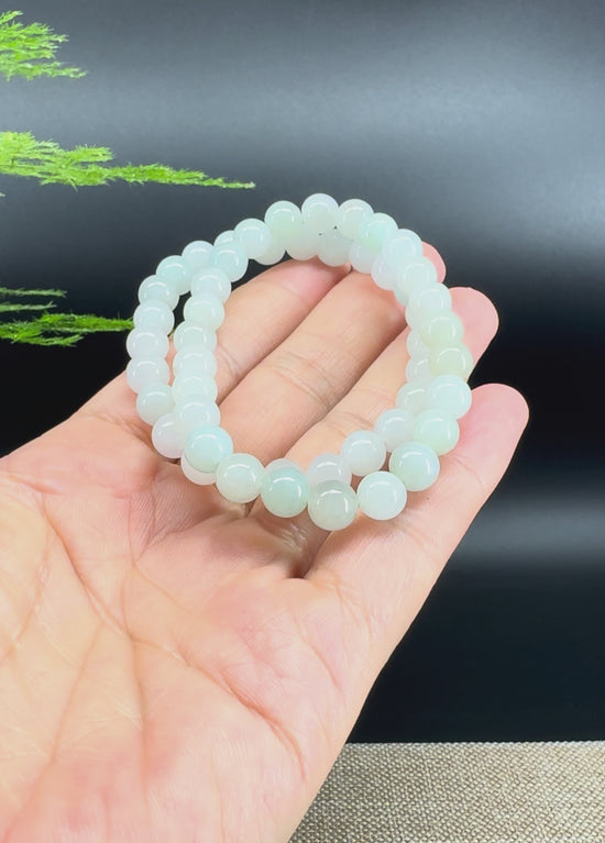 Load and play video in Gallery viewer, RealJade® Co. Genuine Jadeite Jade Round Icy Green Beads Bracelet (7 mm)
