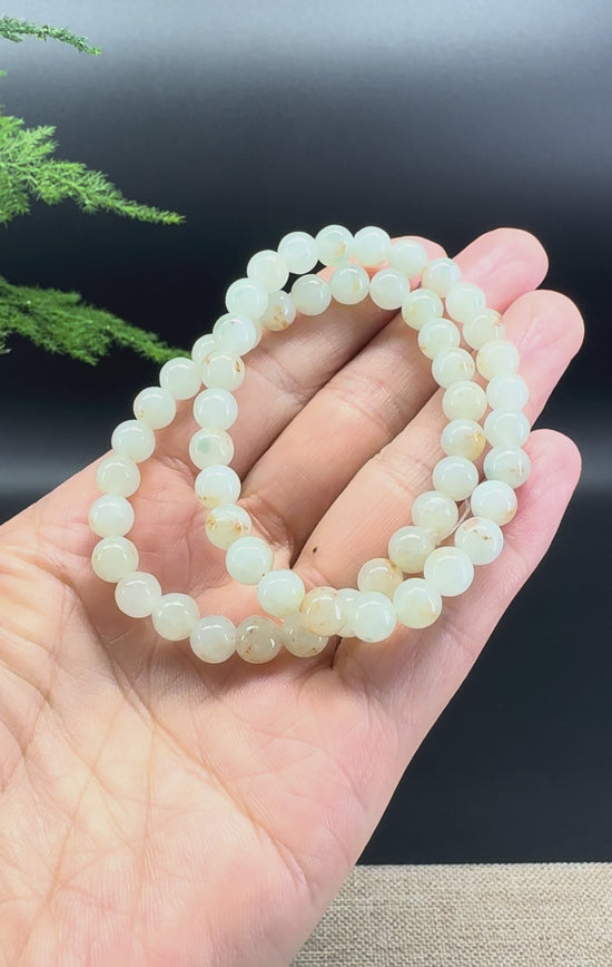 Load and play video in Gallery viewer, Natural Jadeite Jade  Round Icy Yellow Sajin Beads Bracelet ( 6.6mm )
