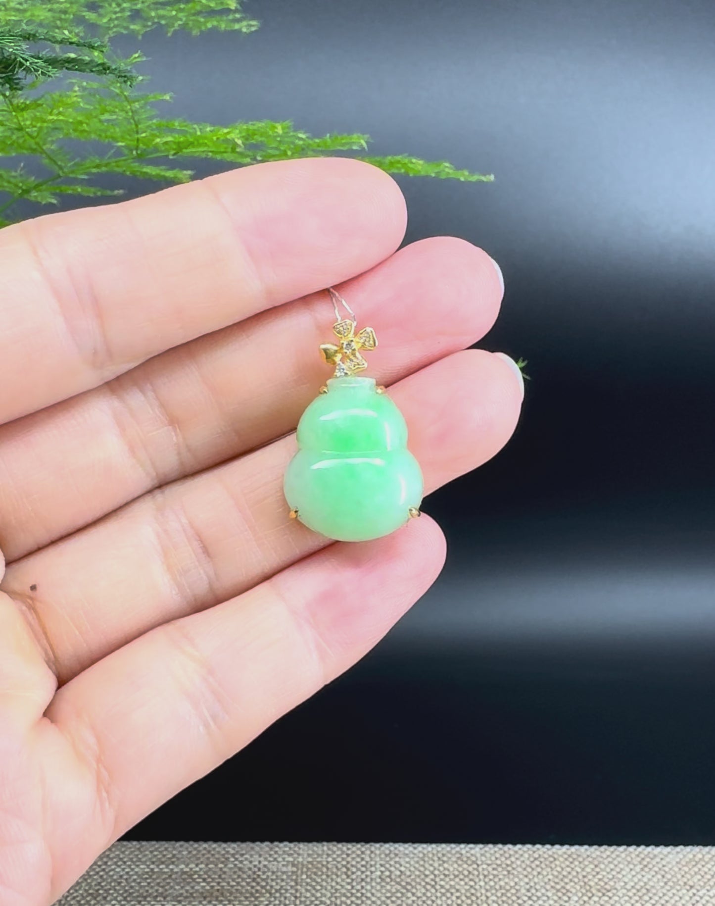 Load and play video in Gallery viewer, RealJade® Co. Genuine Green Jadeite Jade Good Luck Hulu Bottle Gourd Necklace With 18K Yellow Gold Bail

