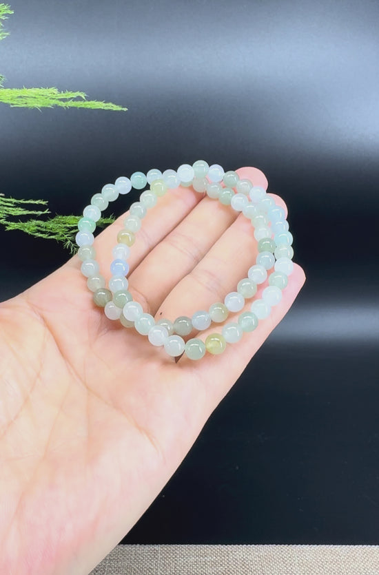 Load and play video in Gallery viewer, Natural Jadeite Jade Round Icy Green Beads Bracelet ( 6 mm )
