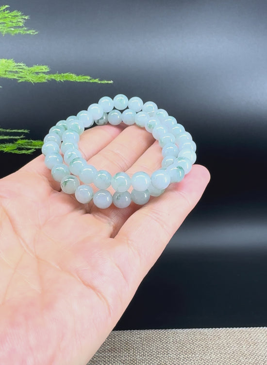 Load and play video in Gallery viewer, RealJade® Co. Genuine Jadeite Jade Round Green Beads Bracelet (7 mm)
